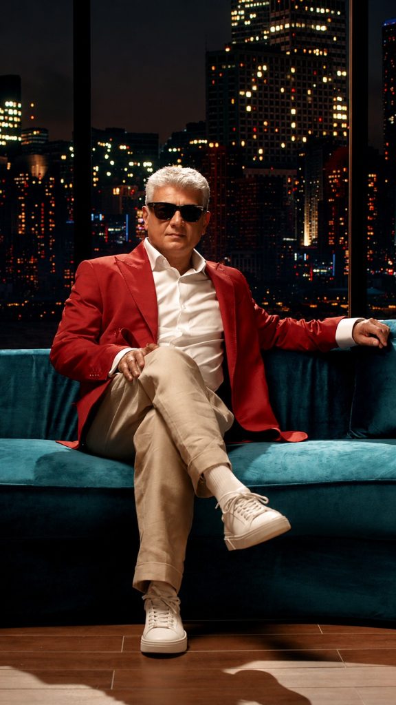 Ajith Kumar in stylish red suit Aug 2026 (1)