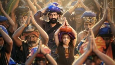Harivarasanam first look poster showing Saiju Kurup and a young girl among Ayyappa pilgrims