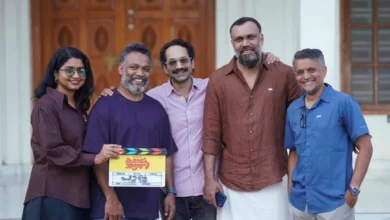 Team members with a Karate Chandran movie clapperboard at the Kottayam shoot launch on 24 October 2026